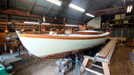 Sanford Alerion #12, inside on stands, bow port side view
