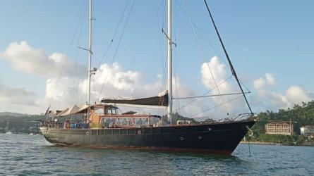 66' 1966 Custom 66 For Sale, in water starboard side bow view