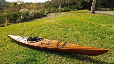 Wooden Kayak Miramichi 17'  - 1 person, starboard side view on grass