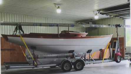 Herreshoff Alerion 26, inside on trailer Starboard side view