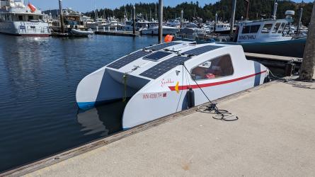 Solar Electric Trailerable Catamaran, docked port side view