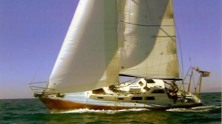 "SHADOWFOX" 31' Ocean crossing cruiser, undersail port side view
