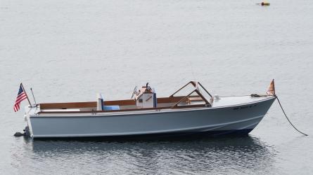One of a Kind Runabout , in water starboard side view