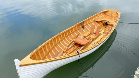 12 Ft Wooden Whitehall Rowboat with Gelcoat reinforcement, in water bow view and above
