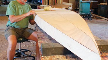 Geoff Kerr working on a Kaholo Standup Paddleboard.