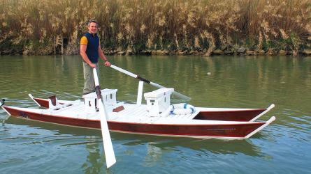 Oar-powered catamaran