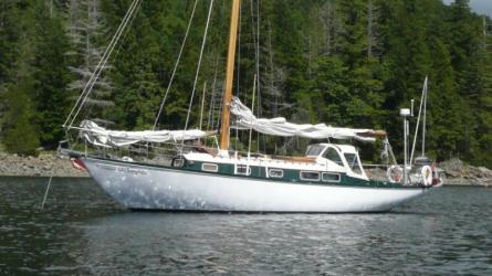 A classic carvel planked mahogany centreboard sloop