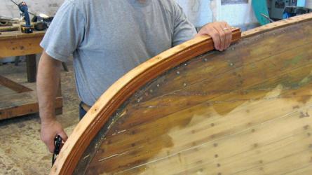 David Soule repairing a hull.