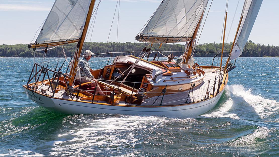 John Williams Boat Co. - WEATHER GAUGE, shown here cruising off the coast  of Labrador, is a A Farr-designed 44 and custom built by Concordia for the  present family in 1984. She