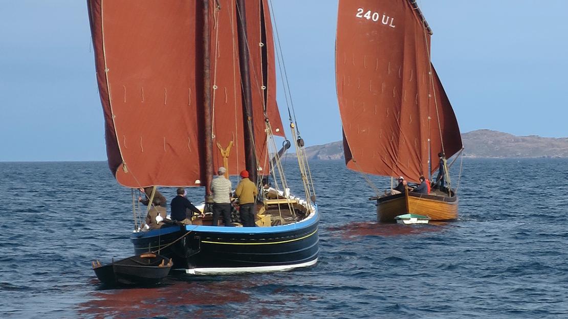 The 50’ Zulu ST. VINCENT of 1910 (left) and the 37’ Lochfyne skiff CLAN GORDON of 1911 (right).