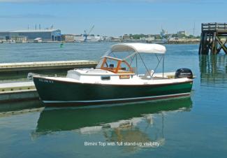 ADELINE docked in Portsmouth, NH - Bimini top with full stand-up visibility.