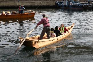 The Isobune is steered by a sculling oar off the transom. 