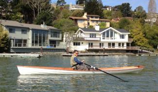 Kwei rowing his Annapolis Wherry on Richardson Bay