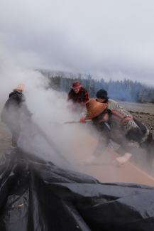 Steaming the canoe with hot rocks and seawater added over 12” to her beam.