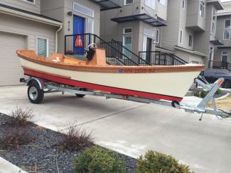 Peeler Skiff on trailer.