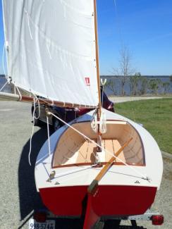 Full sail ashore.  Stern view.