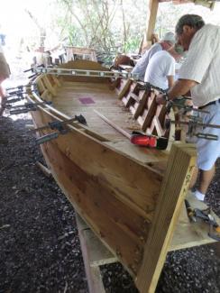 Construction of our Sharpie Skiff: Cedar plank, lapstrake hull.