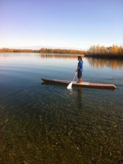 Stanley Madsen testing the shallows on his new paddleboard.