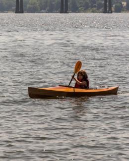 FLORA B., a Chesapeake Light Craft Wood Duckling kayak.