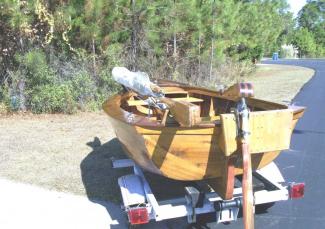 Motor mounted on dinghy.