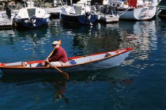 WU WEI under way with Swarup Wood at the oars.