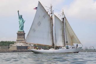 Arctic schooner BOWDOIN and Lady Liberty. Photo courtesy ACB Facebook.