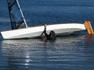 Viola 14 Sailing Canoe righting from capsize by Viola Spek the boat's namesake.