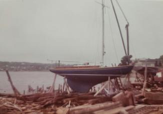 1920 Herreshoff S Boat in need of restoration, on the hard starboard side view