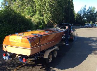 1953 Chris Craft speed boat, on trailer view from stern starboard side