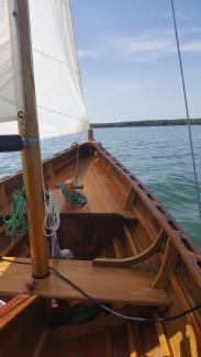 19' 7" Ketch Rigged Sailboat, undersail, view of bow and water and blue skies with wispy clouds