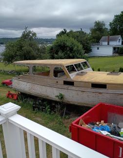 38' foot Matthews deluxe stock cruiser , on the lawn starboard side view