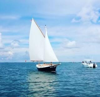 Custom Phil Bolger Wooden Triple-Keel Sloop, undersail starboard side bow view