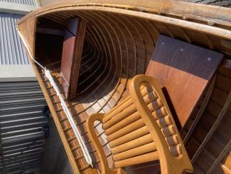 CW Barrett Bros Rangeley  , folded seat, inside boat