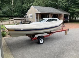 Penobscot 14, on trailer, covered, starboard view