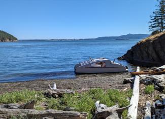 Solar Electric Trailerable Catamaran, beached at a perfect location