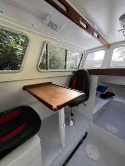 Tolman Jumbo 24, view of dining/sitting area inside