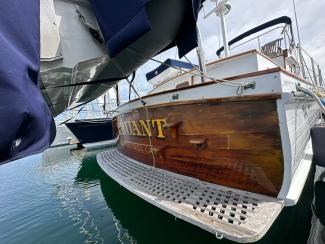 1969/1975 Monk Sr. Trawler, view of stern, docked in water