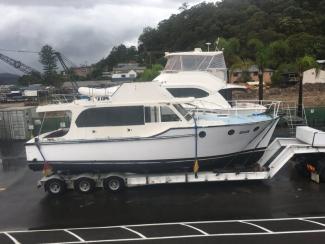 X, 38' Flybridge cruiser built by Wal Shirt.