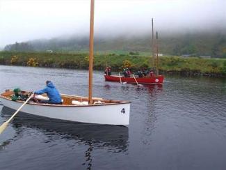 The Goat Island Skiff works well whether Rowing or Sailing. Light and simple outperforms heavy and complicated