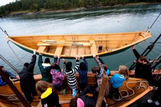 Launching a dory from PACIFIC GRACE to explore the Gulf Islands.