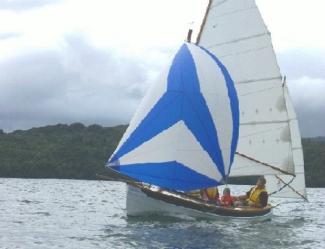 A soinnaker gives John Leathwick and his family a real lift in light weather