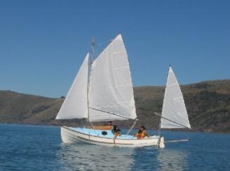 Peter Croft built his Pathfinder with the optional cabin, here he is on New Zealands Akaroa harbour