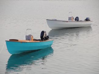 2 fuel efficient PT Skiffs at anchor from Port Townsend Watercraft