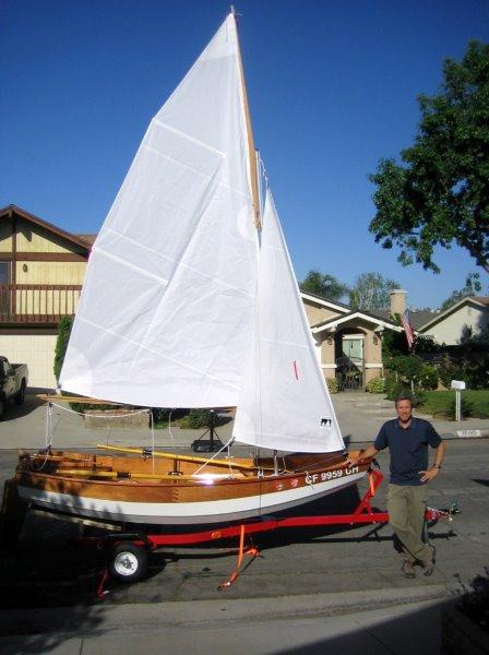 Passagemaker dinghy with sail.