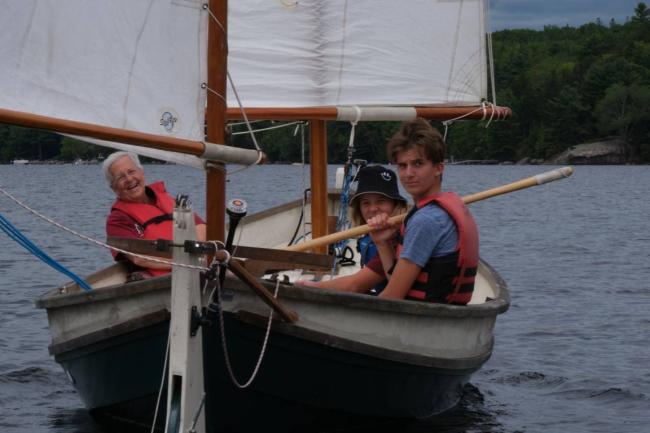 2014 Oughtred Caledonia Yawl 19', happy people sailing in water, view of stern