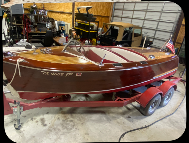 1948 Century 17' Sea Maid, on trailer inside, port side bow view