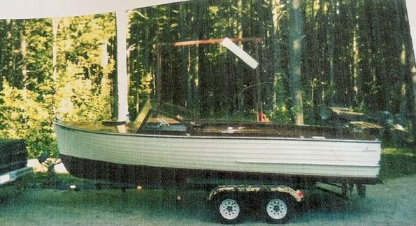 1959 23' Lyman Runabout, on trailer port side view