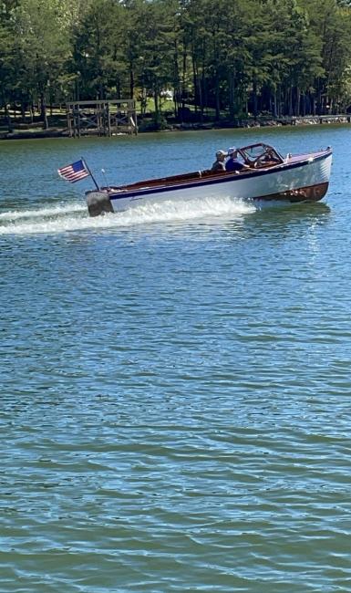 1959 Lyman, underway starboard side view