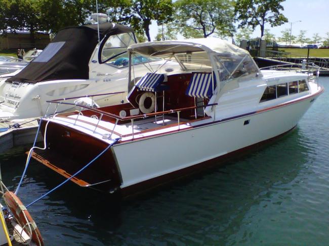 1963 Chris-Craft Futura 33', docked starboard stern view