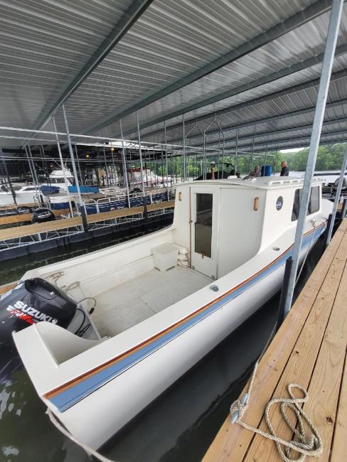 2008 27' custom cruiser, docked starboard side view